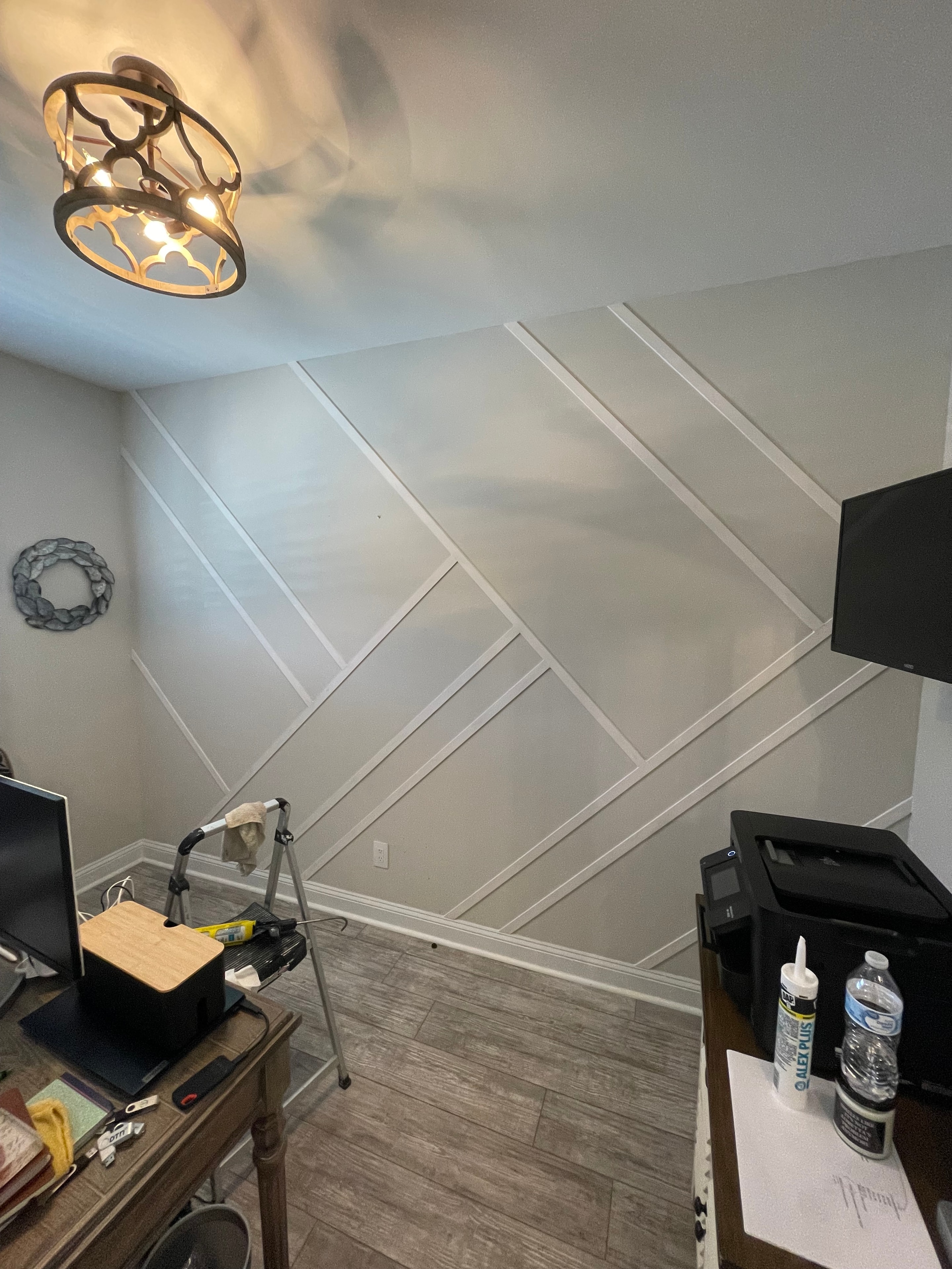 Chevron accent wall paneling installation