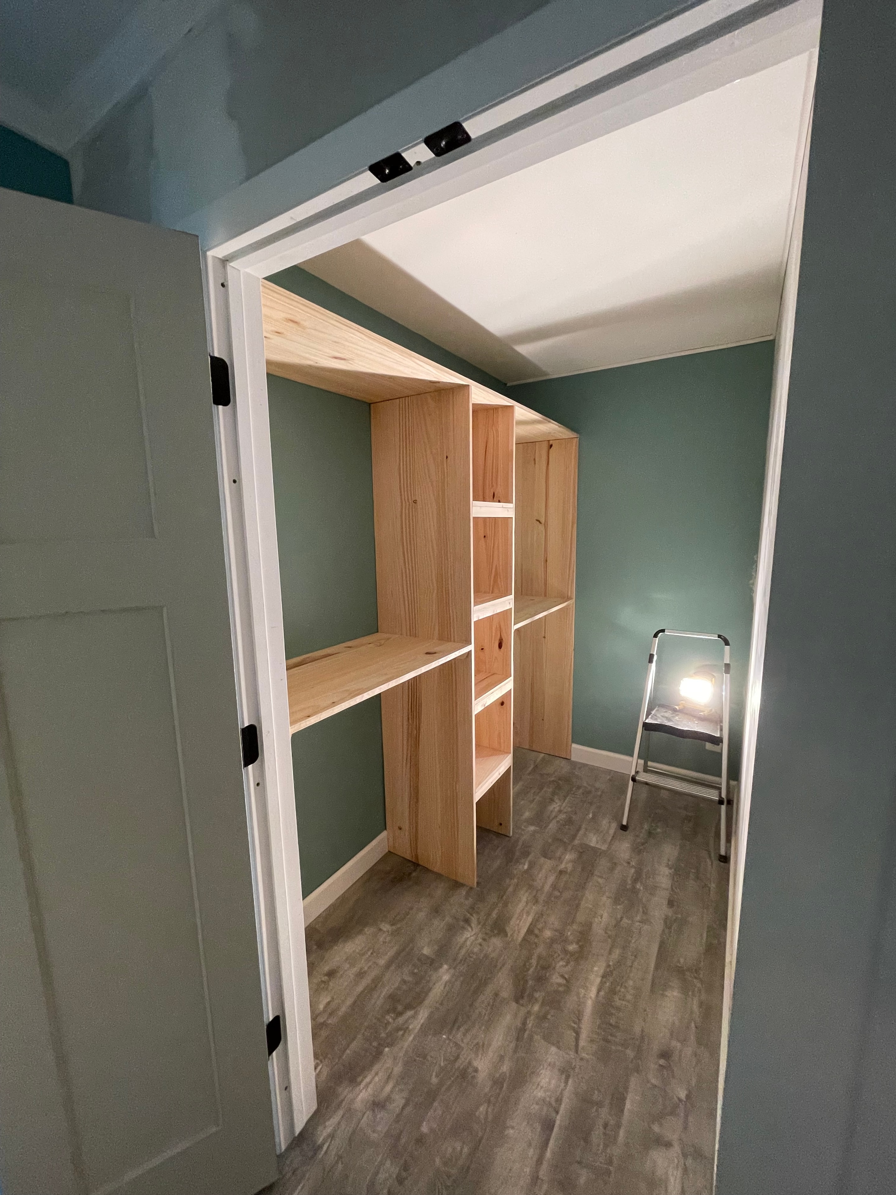 Custom built-in storage framing with tile wall