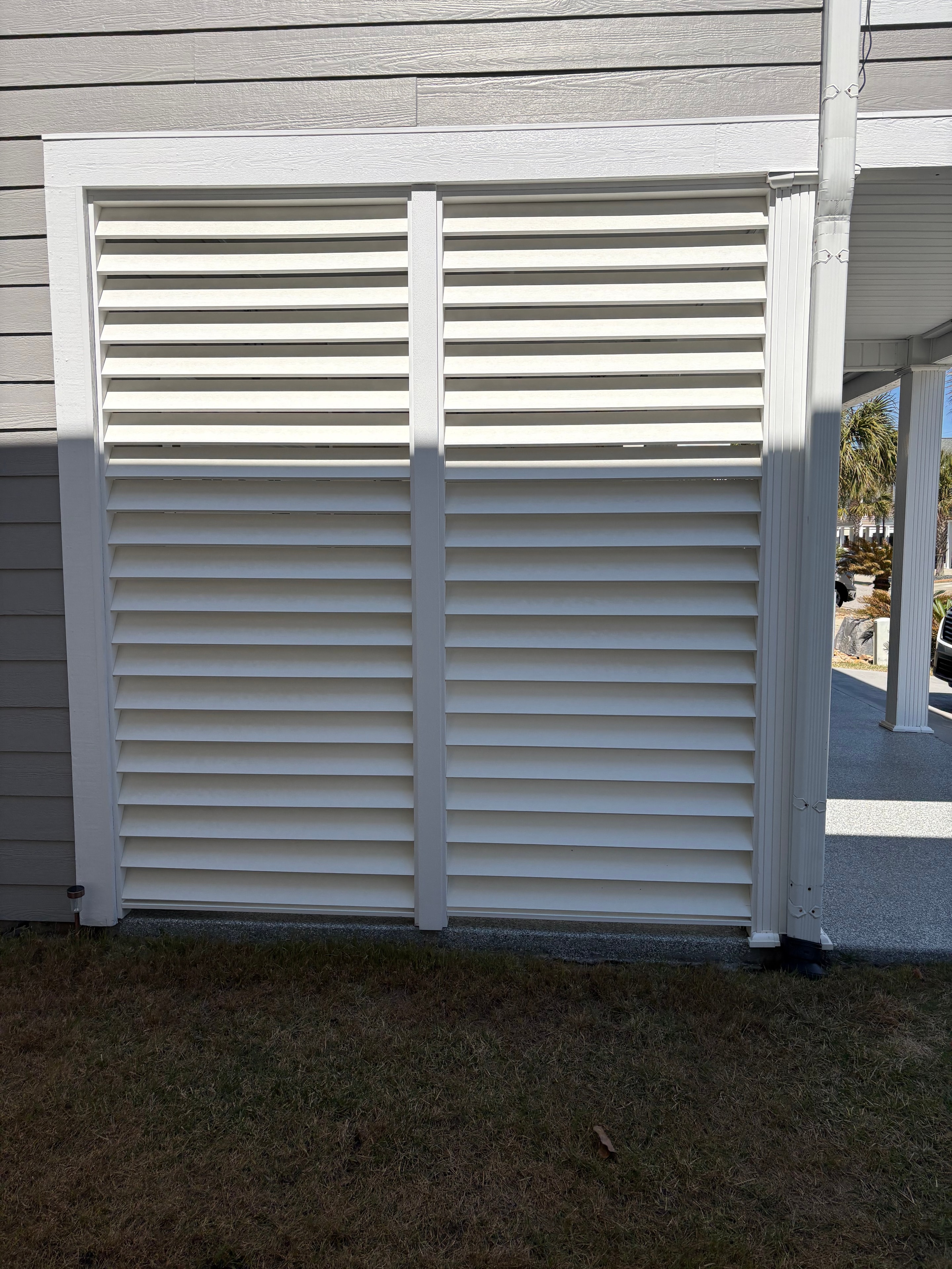 White vinyl privacy gate installation